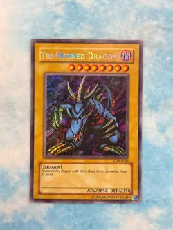 YUGIOH TRI-HORNED DRAGON SECRET RARE EXCELLENT CONDITION LOB-E000 (1) - Image 1