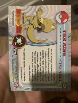 1999 Topps Pokemon TV Animation #63 Abra Rainbow Foil Black Logo - Image 2