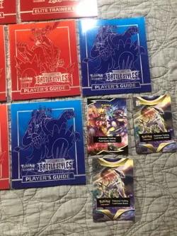 Lot of 7 Pokemon Player Guide Books + ETB Posters & Rulebooks - Image 5
