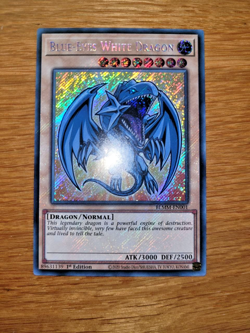Yugioh Blue Eyes White Dragon BLMM-EN001 Secret Rare English 1st Edition Chibi - Image 1