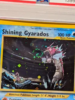 Shining Gyarados 65/64 Double Holo Error Neo Pokemon PSA 7 Perfect Roar Swirl - Image 1