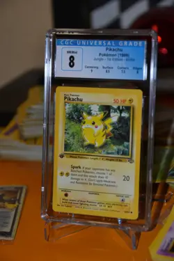Pokemon TCG CGC 8 NM/M Pikachu 60/64 JUNGLE 1st Edition w Subgrade - Image 1
