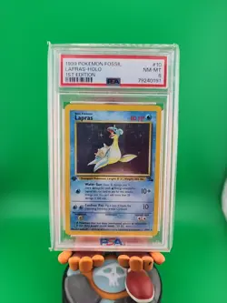 PSA 8 Pokemon 1st Edition Lapras Holo Fossil 1999 - Image 1