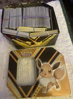 Pokemon TCG V Powers Tin Eevee V w/Variety Lot Pokemon Cards - Image 1