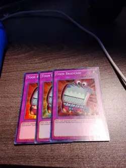 3x Yugioh Toon Briefcase DRL2-EN029 Super Rare 1st Ed - Image 1