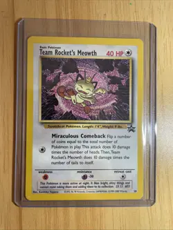 Team Rocket's Meowth 18 WOTC Black Star Promo Pokemon Card - Image 1