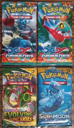 4x Pokemon 2 Furious Fists,1 Evolving Skies, 1 Sun&Moon Sealed Pack Lot 4 - TCG - Image 1