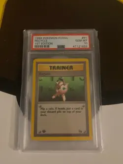 1999 POKEMON FOSSIL 1ST ED #61 RECYCLE PSA 10 - Image 1