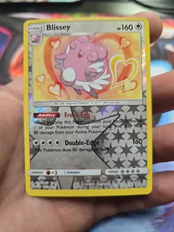 Blissey 102/145 Sun & Moon Guardians Rising Reverse Holo Rare Pokemon TCG Card - Image 1