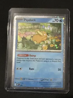 Psyduck (Cosmos Holo) Mega Evolution Promo SVP 007 Pokemon Card NM - Image 1