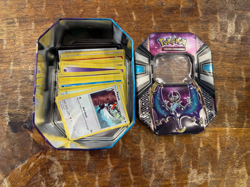 Pokemon Tins with random card lot + 11 Pokemon-GX cards, gently used condition - Image 3