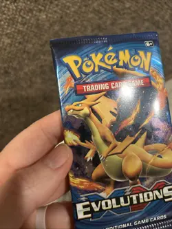 Pokemon Evolutions Booster Pack Charizard Art 10 Cards English TCG - Image 3