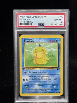 Psyduck #65 1st Edition Team Rocket 2000 Pokemon PSA 8 💦 - Image 1