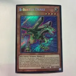 Yugioh B-Buster Drake LCKC-EN020 Secret Rare NM Unlimited - Image 1