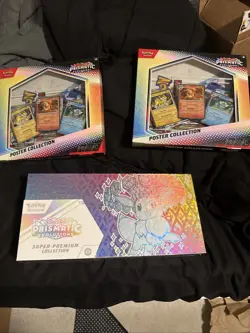 Pokemon TCG Factory Sealed Prismatic SPC And Two Prismatic Poster Collections - Image 1