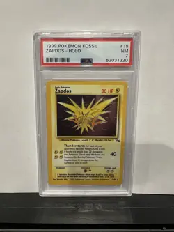 1999 PokeMon Fossil TCG Zapdos #15 Holo PSA 7 - Image 1