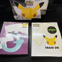 Pokemon 25th Anniversary Celebrations Lunch Box Tin + Promo cards + two binders - Image 1