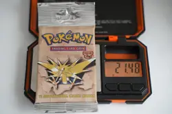 21.48g Pokemon WOTC Fossil Unlimited Booster Pack Vintage Sealed TCG Zapdos - Image 1