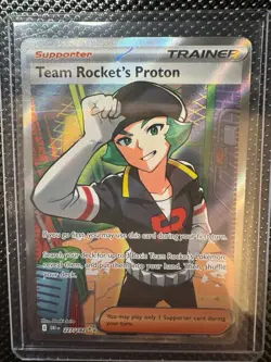 Pokemon TCG Team Rocket’s Proton 227/182 Full Art Trainer Destined Rivals - Image 1
