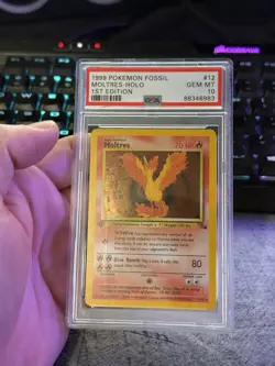 1999 Pokemon Fossil 1st Edition #12 Moltres Holo – PSA 10 GEM MINT - Image 1