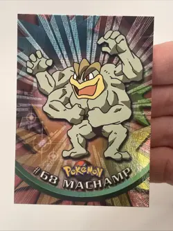 1999 Topps Pokemon #68 Machamp Holo Black Logo Series 1 In Top Loader - Image 1