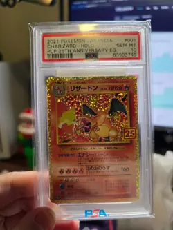 Pokemon PSA 10 Gem Mint Japanese 25th Anniversary Charizard Holo 001/025 - Image 1