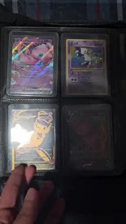 Pokemon cards in pokemon binder. - Image 2
