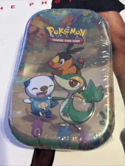 Pokemon TGC 25th Anniversary Celebrations Mini Tin New Factory Sealed dented - Image 1