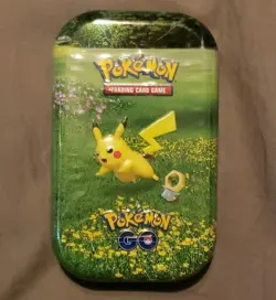 Pikachu Pokemon GO Mini Tin 2 Booster Packs 1 Coin 1 Art Card Pokemon TCG *NEW* - Image 1