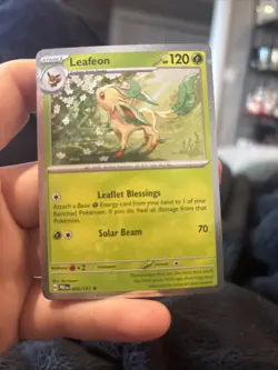 Pokemon - Prismatic Evolutions Cosmos Holo Leafeon 005/131 NM - Image 1