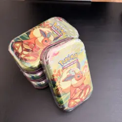 Pokemon TCG: Scarlet & Violet-Prismatic Evolutions Mini Tin - Image 1