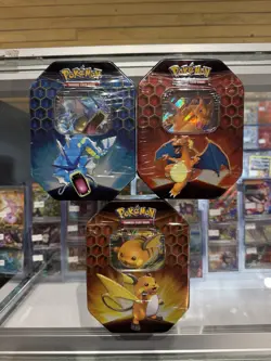 Pokemon Hidden Fates Tins Charizard Gyarados Raichu GX Boxes - Set of 3 - Image 1