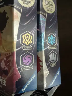 Disney Lorcana TCG: Starter Packs Amber/Amethyst & Sapphire/Steel First Chapter - Image 2