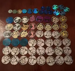 Pokemon TCG Coins Lot of 64 coins, includes Rare Mid-era Silver Dialga Coin - Image 1