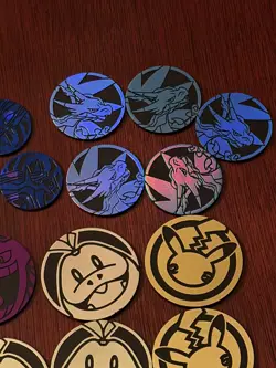 Pokemon TCG Coins Lot of 64 coins, includes Rare Mid-era Silver Dialga Coin - Image 2