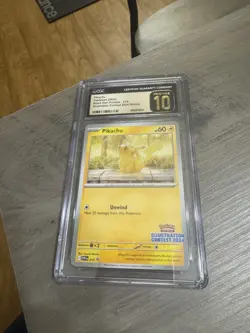 Pokemon CGCPristine10 Pikachu Black Star Promo Card 214Illustration Contest 2024 - Image 1