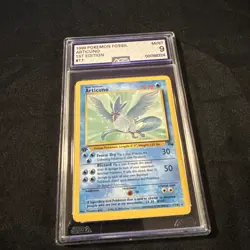 1999 POKEMON FOSSIL SET 1ST EDITION #17 ARTICUNO PSA 9 - Image 1