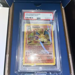 1999 POKEMON BASE SET UNLIMITED #4 CHARIZARD-HOLO PSA 1 - Image 1