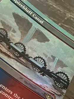 Spirebluff Canal (Borderless, Foil) Outlaws of Thunder Junction (OTJ) EN R 0304 - Image 3