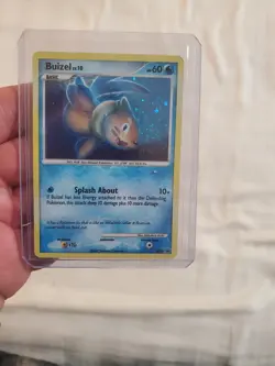 Buizel DP13 Diamond and Pearl Holo LP Pokemon card with top loader - Image 1