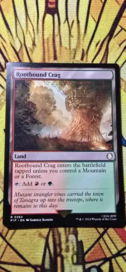 Rootbound Crag Universes Beyond: Fallout Regular Land Rare MTG NM - Image 1