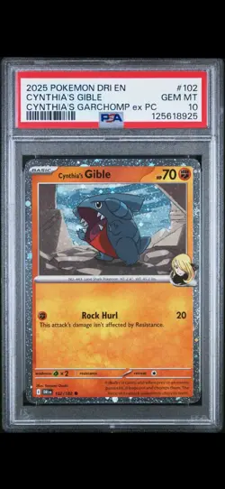 2025 POKEMON DRI CYNTHIA'S GARCHOMP EX PREMIUM COLL #102 CYNTHIA'S GIBLE PSA 10 - Image 1