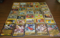 POKEMON 35 CARD DRAGON TYPE CHARACTER LOT INCLUDES 1 EX OR GX, V OR VMAX CARD - Image 1