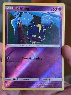 POKEMON COSMOG 64/149 COMMON REVERSE HOLOFOIL SUN & MOON BASE LP CARD - Image 1