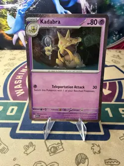 Kadabra 064/165 Scarlet & Violet 151 Cosmos Holo Rare Holo Pokemon Card - Image 1