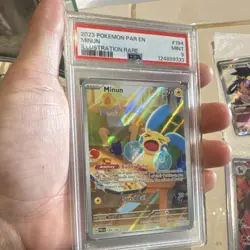 The Pokemon Company Minun Paradox Rift Illustration Rare Holo PSA 9 194/182 - Image 1