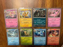 Prismatic Evolutions Costco 8 Mini Tin Cosmos Promo Card Set - Image 1