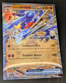 POKEMON DESTINED RIVALS 17 X 24 CYNTHIA'S GARCHAMP ETHAN'S HO-OH LENTICULAR CARD - Image 2