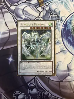 (YCL) Stardust Dragon - #PGLD-EN076 - Premium Gold Holo VLP - Image 1