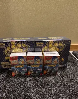 Pokemon: 2 surging sparks ETBs 3 booster bundles - Image 1
